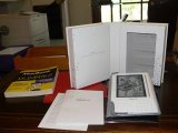 Kindle with protective cover.